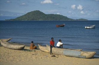 MALAWI, Lake Malawi, Cape Maclear.  Boys with fishing boats.