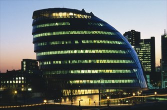 ENGLAND, London, "GLA Building located Southwark, illuminated at dusk"