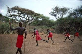 KENYA, Tribal People, Masai Moran practising hunting skills.