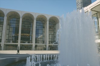 USA, New York, Manhattan, Lincoln center with fountain outside entrance