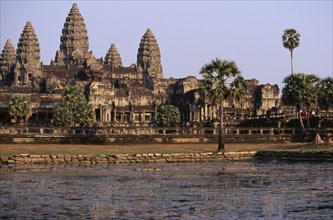 CAMBODIA, Siem Reap, Angkor Wat, The central complex seen across the water lilly pond