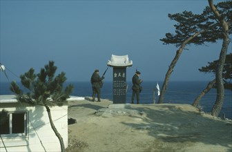 SOUTH KOREA, Demilitarized Zone, Armed guards on the east coast looking out from North Korean