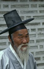 SOUTH KOREA, Religion, Confucian, Portrait of elderly man in traditional robe and kat horsehair hat