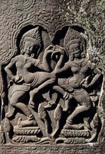 CAMBODIA, Siem Reap Province, Angkor Thom, The Bayon.  Detail of carving of two dancing Asparas