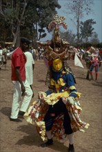 SIERRA LEONE, Festival, Kaka Devil secret society masked dancer