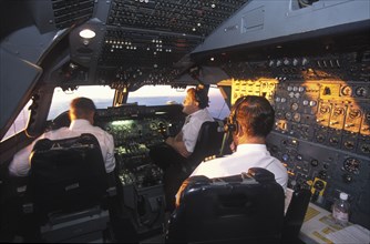 SOUTH AFRICA, Central, South African Airways Boeing 747 300 cockpit with pilot and crew at daybreak