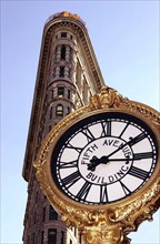 USA, New York State, New York City, Flat Iron Building and clock on 5th Avenue