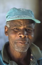 SOUTH AFRICA, Western Cape, Paarl, Portrait of male agricultural worker at Fairview goats cheese