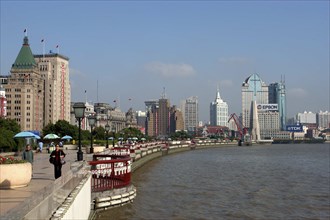 CHINA, Shanghai, The Bund aka Zhong Shan Road. View along the promenade that runs along the Huangpu
