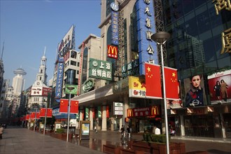 CHINA, Shanghai, Nanjing Road walking street. Commercial shopping street with building facades