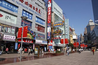 CHINA, Shanghai, Nanjing Road walking street. Commercial shopping street with building facades