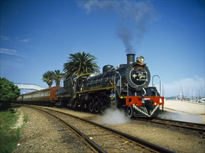 SOUTH AFRICA, Western Cape, Knysna, Tootsie engine of the National Train Collection travelling