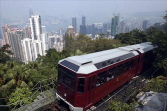 HONG KONG, General, Hillside cable car carriage overlooking the cityscape below