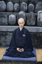 JAPAN, Zen, Buddhist Monk in Half Lotus position