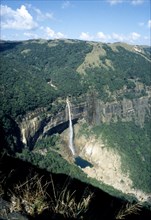 INDIA, Meghalaya, Cherrapunji, Waterfall cascading from plateau into plunge pool below