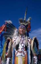 CANADA, Alberta, Lethbridge, Blood Tribe member in traditional dress at a Pow Wow