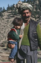 AFGHANISTAN, Paktia Province, Portrait of Jaji tribesman and son.  The Jaji are one of the Pathan