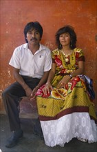MEXICO, Oaxaca, Juchitan, Portrait of young Indian couple.