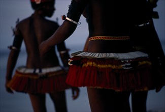 PAPUA NEW GUINEA, Trobriand Islands, Cropped shot of girls dressed for traditional dance