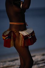 PAPUA NEW GUINEA, Trobriand Islands, Cropped shot of girl dressed for traditional dance