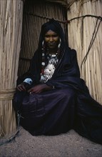 NIGER, People, Women, Portrait of Tuareg woman wearing full bridewealth jewellery.