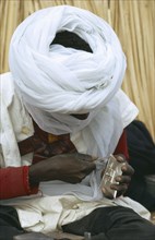 ALGERIA, Tribal People, Tuareg silversmith.