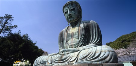 JAPAN, Honshu, Kamakura, Daibutsu or Great Buddha. Seated Buddha statue cast in bronze and
