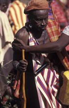KENYA, Kajiado, Many of the Maasai men get so drunk on Gourds filled with honey beer that they can