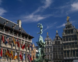 BELGIUM, Flemish Region, Antwerp, Grote Markt or Main Square.   The Brabo Fountain flanked by the