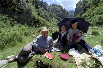 CHINA, Gansu, Langmusi, Family Picnic near the outskirts of town