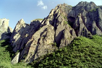 CHINA, Gansu, Langmusi, Rocky outcrop in one of the many valleys