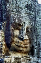 CAMBODIA, Angkor, The Bayon. One of the faces of the late twelth to early thirteenth century