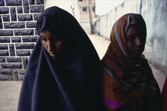 KENYA, Nairobi, Two Somali women with covered heads.