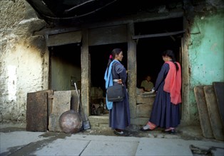 INDIA, Ladakh, Leh, Ladies at the bakery waiting for fresh bread