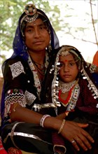 INDIA, Rajasthan, Udaipur, Portrait of a mother and child