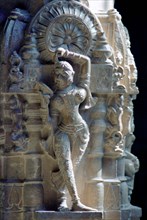 INDIA, Rajasthan, Mt Abu, Decorative carved marble figure at one of the Dilwara Temples