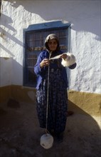 TURKEY, Crafts, Elderly woman spinning a ball of wool