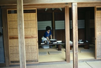 JAPAN, Kagoshima, Satsuma, Home of the potter Chinjukau with moveable wooden screens open to reveal