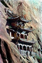 CHINA, Gansu, Zhangye, Mati sa Temple built into the cliff side