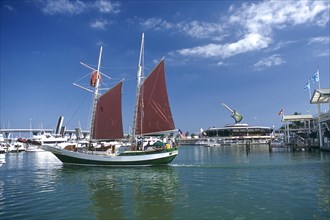 USA, Florida, Miami, View of sailboat leaving Bayside harbour