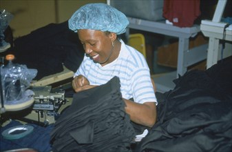 JAMAICA, Montego Bay, Industry, Free zone worker in garment factory.