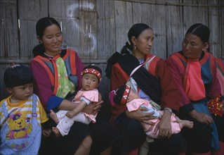 THAILAND, North, Baan Mai Suai, Lisu women and babies.