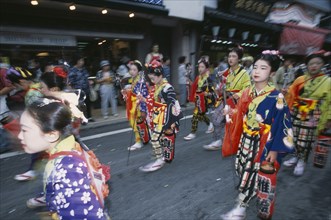 JAPAN, Chiba, Narita, Festival procession with young girls wearing traditional kimonos during the