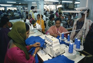 BANGLADESH, Dhaka, Female employees working in garment factory.