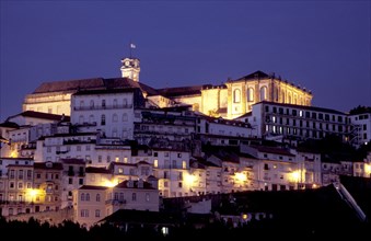 PORTUGAL, Coimbra, University illuminated at dusk