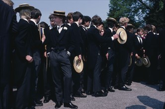 ENGLAND, Education, Harrow School boys wearing straw boaters and tail suits at Speech Day