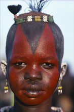 SUDAN, Darfur Province, Body Decoration, Dinka girl decorated with Liria on a Tifta or face paint