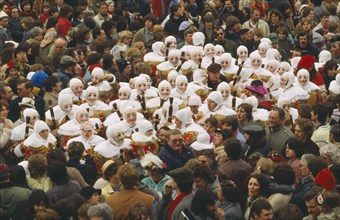 BELGIUM, Binche, The Gilles in costume amongst the carnival crowds