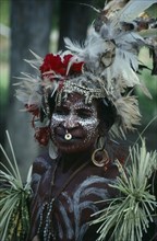 PAPAU NEW GUINEA, Karawari River, Ymas Two Village, Woman decorated with feathered hat white face