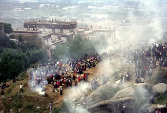 CHINA, Tibet, Drepung Monastery, Festive celebrations with crowds gathered at the Monastery